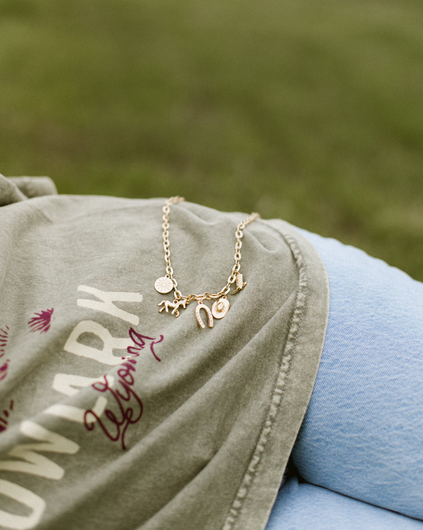 Cowboy romance bookish charm necklace inspired by the Rebel Blue Ranch series by Lyla Sage.