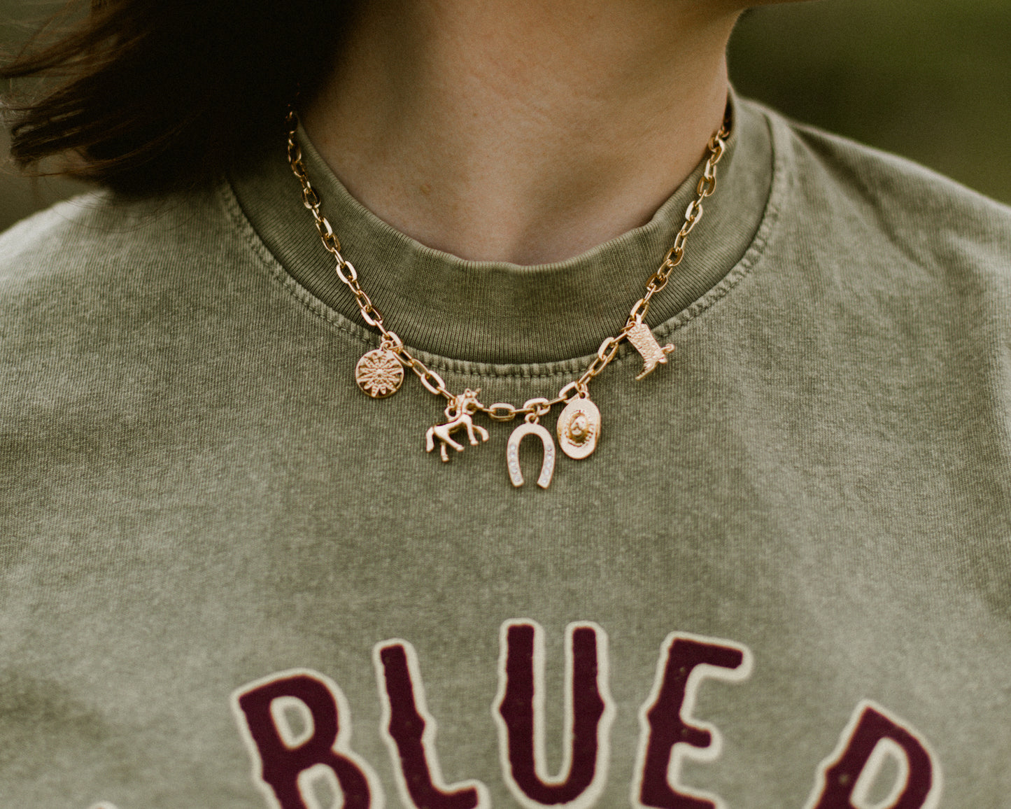 Cowboy romance bookish charm necklace inspired by the Rebel Blue Ranch series by Lyla Sage.