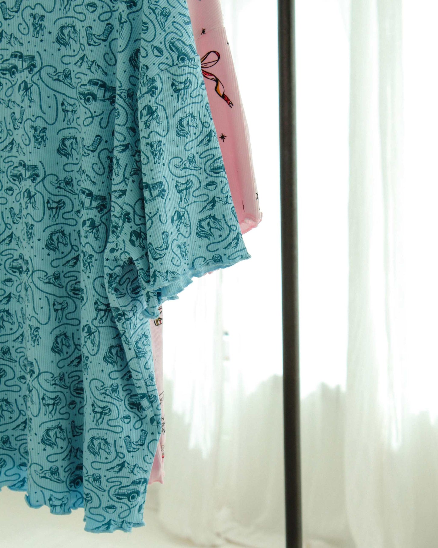 The Rebel Blue Ranch Lounge Set from Next Chapter is officially licensed by Lyla Sage, the author of the cowboy romance book series. Cozy bookish pajamas and sleepwear. Bookish loungewear for readers.