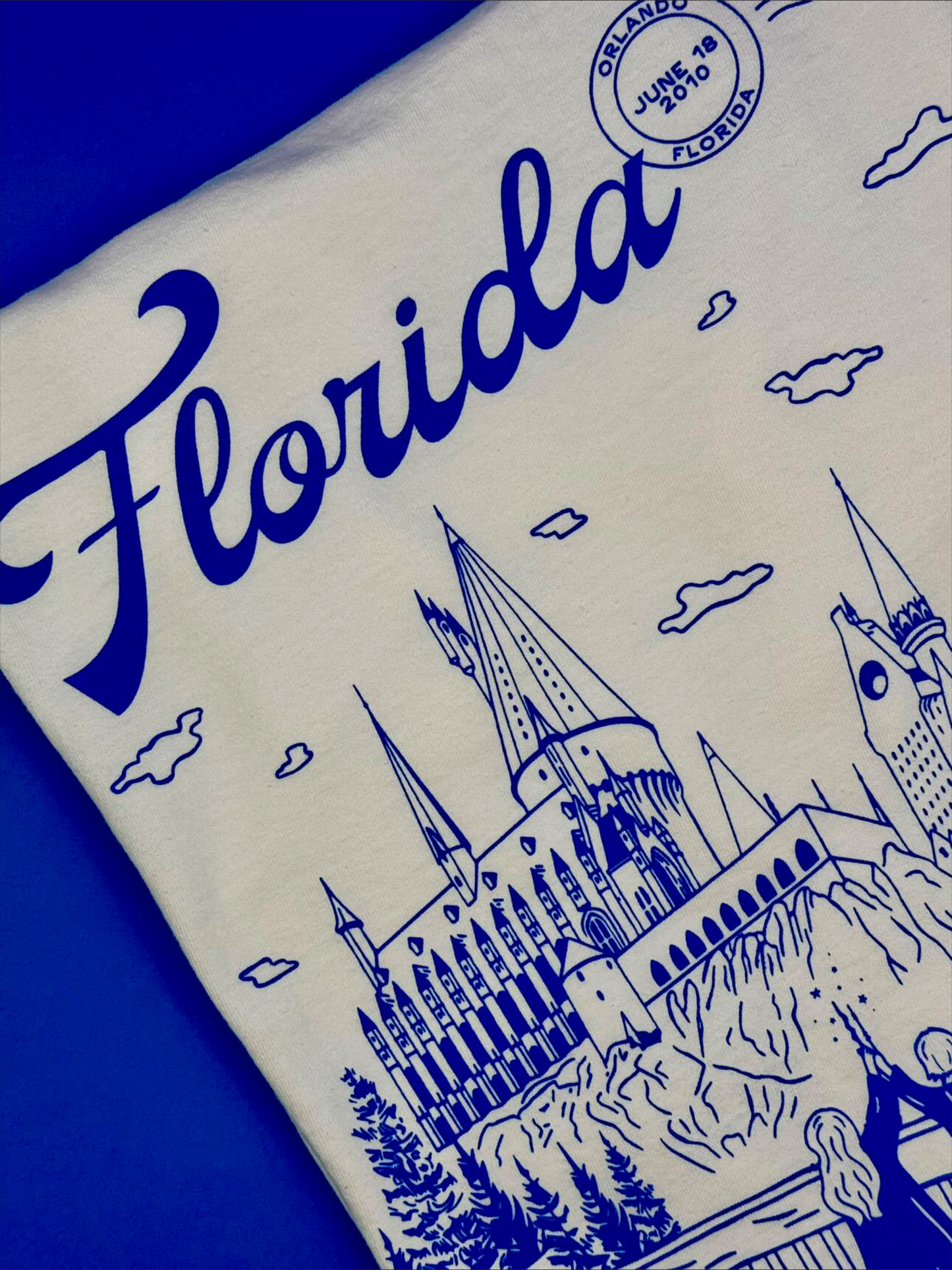 Florida Wizarding Parks Tee. A t-shirt that depicts the Wizarding World of Harry Potter theme park. The t-shirt also references Taylor Swift's song "Florida!!!" as well as the opening date of the park.