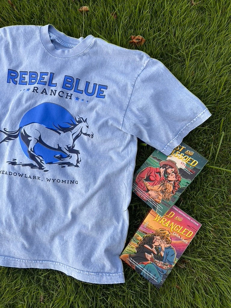 Rebel Blue Ranch Tee. Mineral wash blue t-shirt. Officially licensed by Lyla Sage and her book, Done and Dusted.