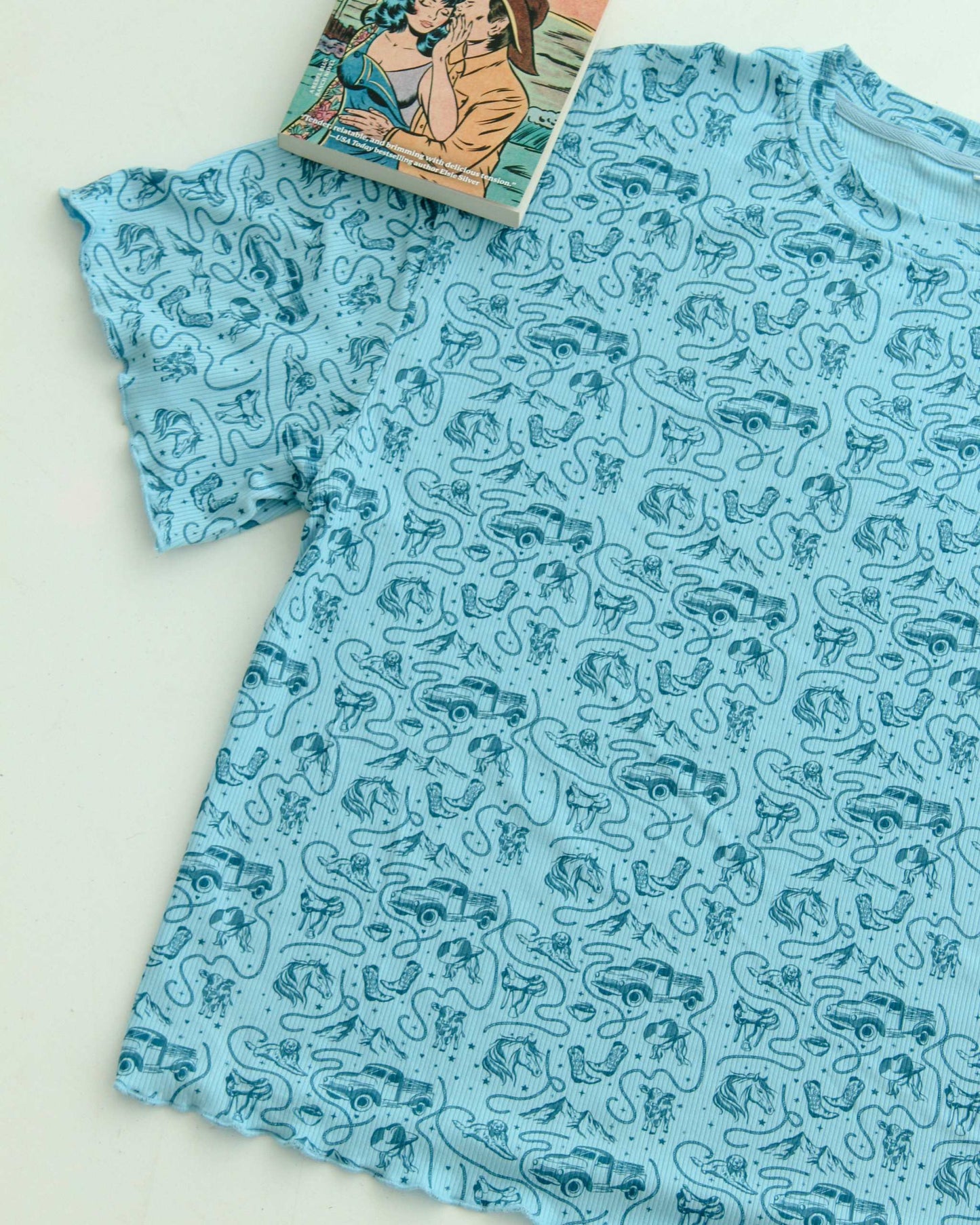 The Rebel Blue Ranch Lounge Set from Next Chapter is officially licensed by Lyla Sage, the author of the cowboy romance book series. Cozy bookish pajamas and sleepwear. Bookish loungewear for readers.