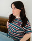 The Bookish Retro Boxy Tee with stripes and an embroidered design from Next Chapter Bookwear, a high quality bookish apparel shop.