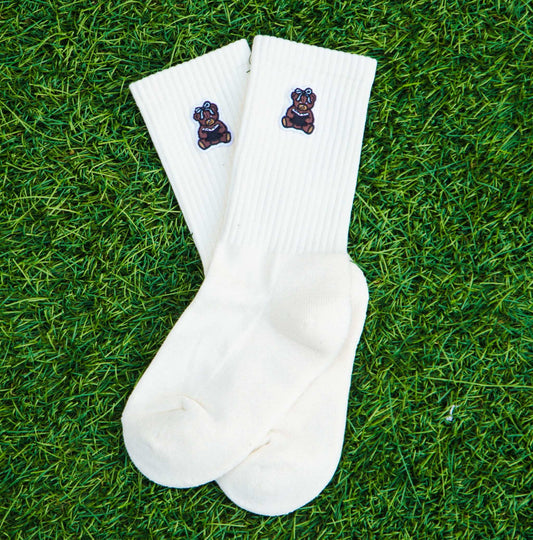 Ivory crew socks with embroidered bear patches on ribbed cuffs, soft and cushioned Book Bear Socks for comfort and breathability