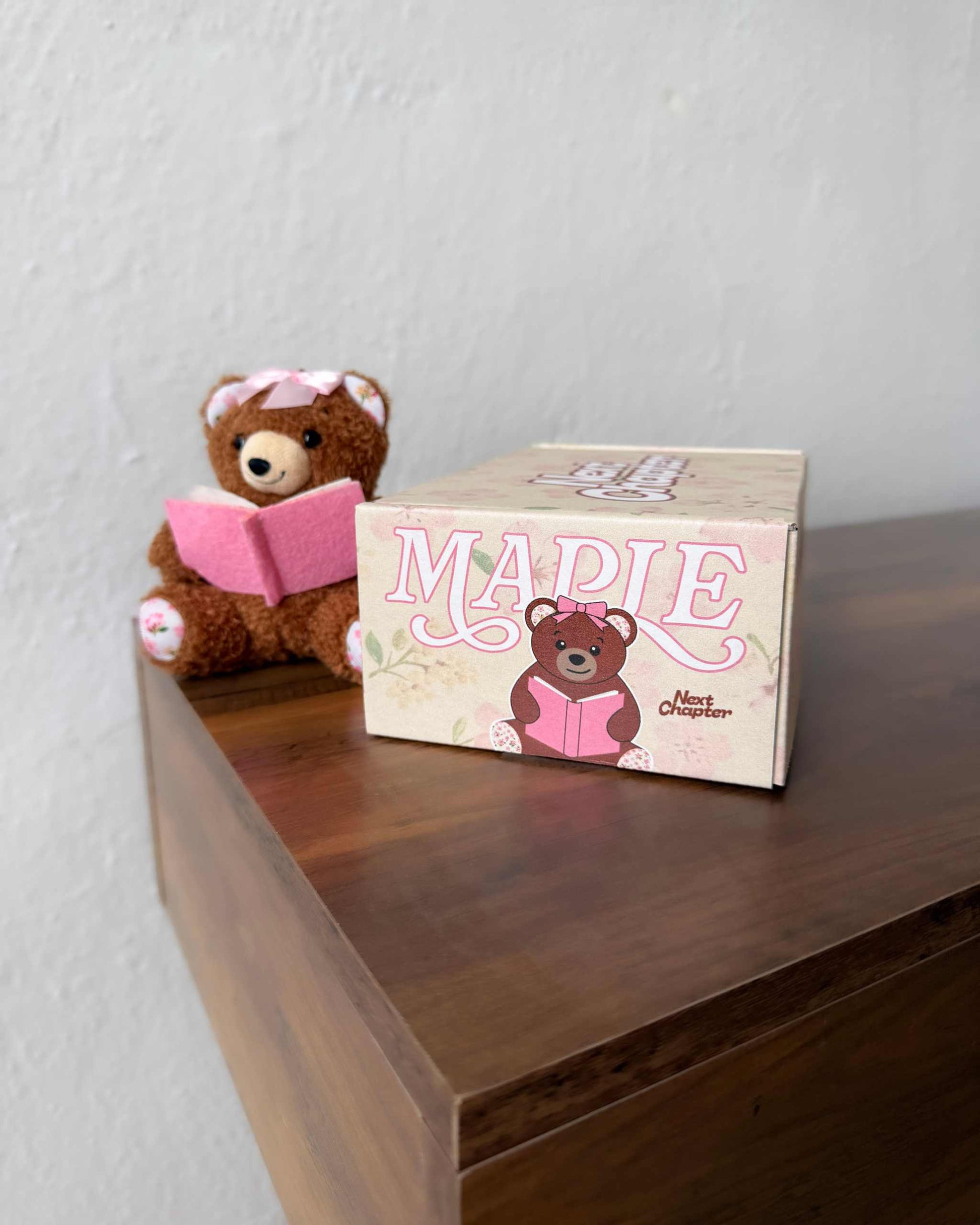 Book Bear Bag Charm from Next Chapter named 'Maple' Next Chapter offers unique and high quality book merch and apparel for readers. Bookish plush. Book plush.