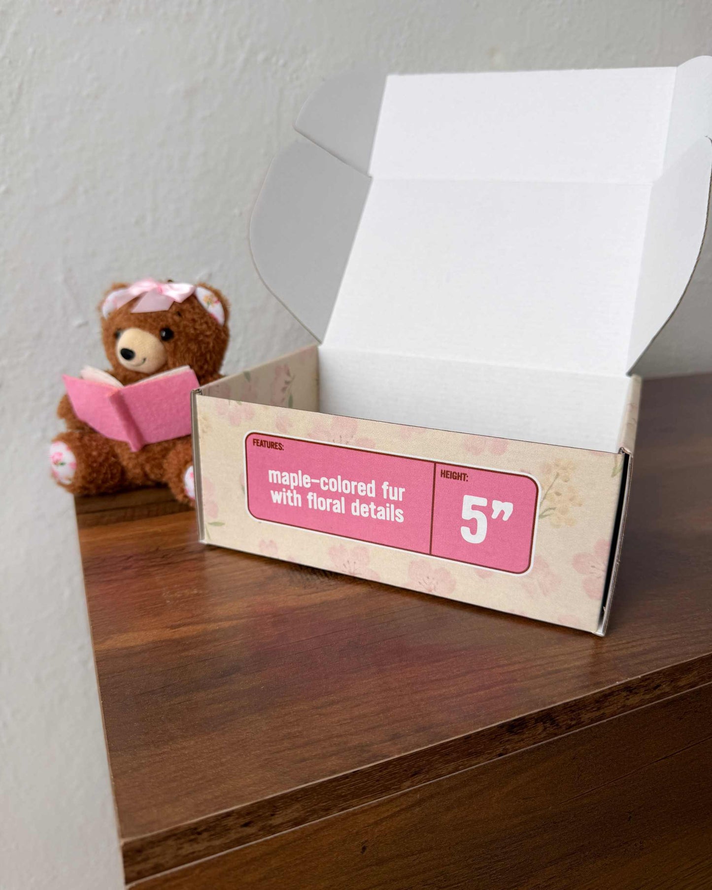 Book Bear Bag Charm from Next Chapter named 'Maple' Next Chapter offers unique and high quality book merch and apparel for readers. Bookish plush. Book plush.