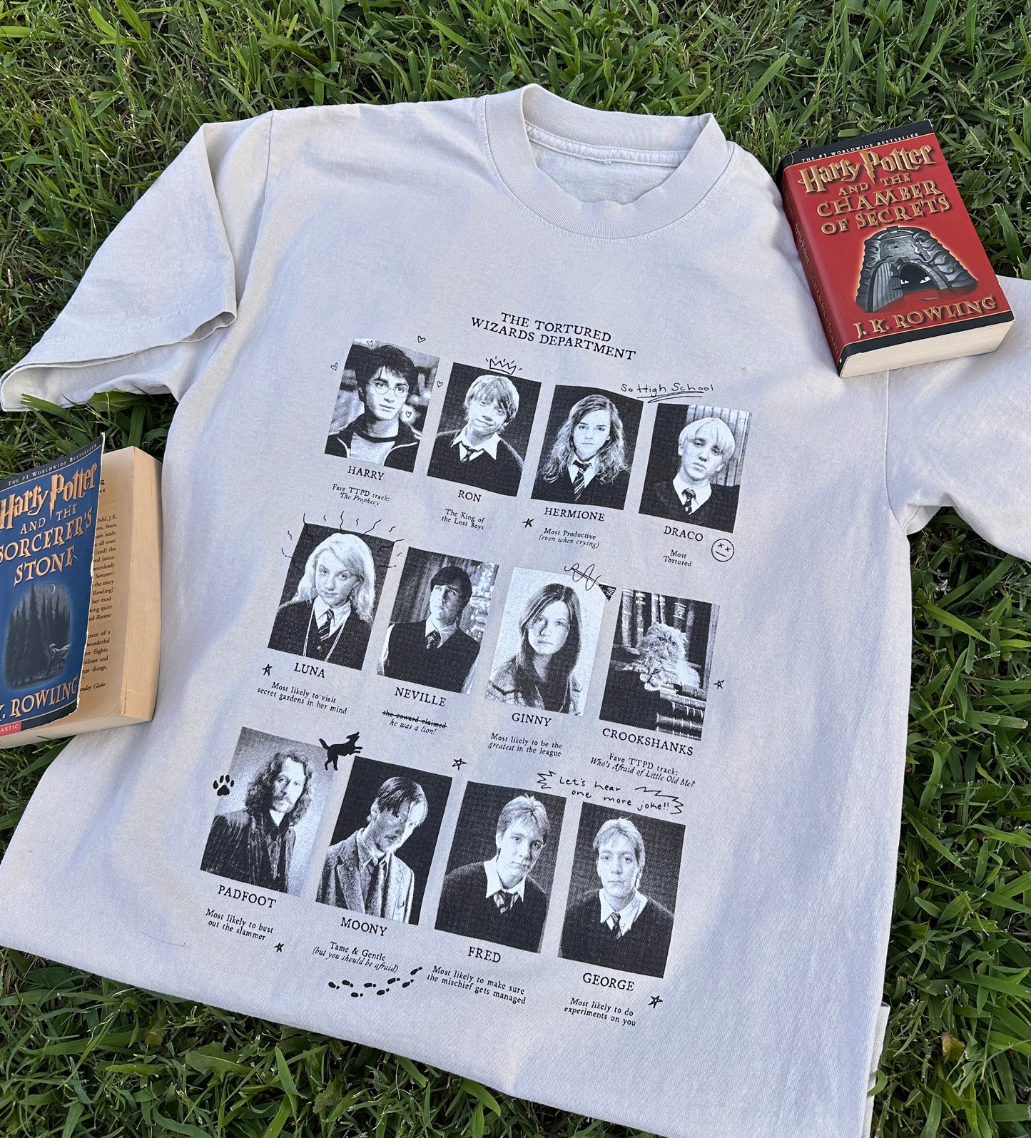 A t-shirt depicting several yearbook style photos of Harry Potter characters. It says "The Tortured Wizards Department." The pictures are paired with lyrics from The Tortured Poets Department by Taylor Swift.