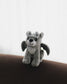 The Bartholomew Gargoyle Plushie from Next Chapter is inspired by The Knight and the Moth and officially licensed by Rachel Gillig. It can be used as a bag charm or bookshelf display!