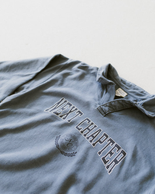 Slate blue Next Chapter collared pullover with navy and white print and relaxed fit