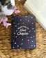 The Next Chapter Kindle Case is bold, vibrant, and covered in colorful stars! It features a cute bookish saying 'Ready For My Next Chapter' on the front and has a hand strap with magnetic backing.