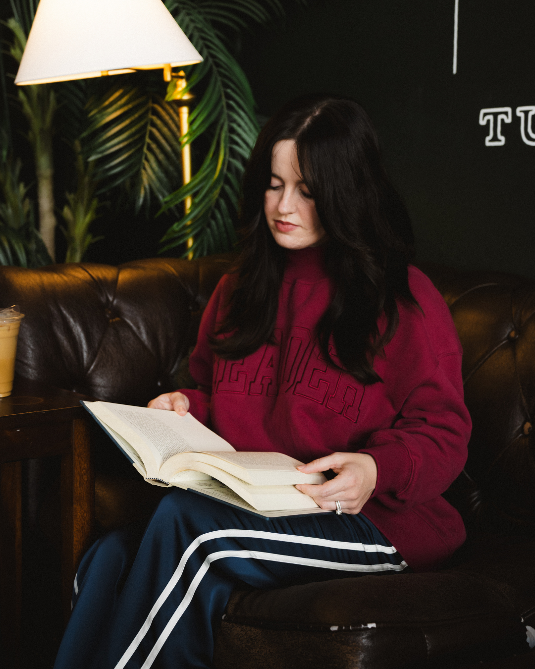 The Reader Mock Neck sweatshirt from Next Chapter features tonal embroidery adn an oversized fit. It's the perfect wardrobe piece for readers and book lovers who love cozy outfits and stylish bookish fashion. 