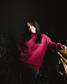 The Reader Mock Neck sweatshirt from Next Chapter is a beautiful berry, dark magenta color with an embroidered 'reader' design across the front. It's the perfect cozy bookish sweater for readers and book lovers.
