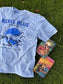 Rebel Blue Ranch Tee. Mineral wash blue t-shirt. Officially licensed by Lyla Sage and her book, Done and Dusted. 